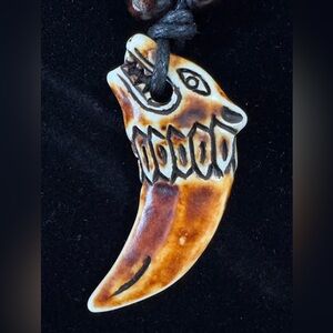 Reptile-Themed Brown Pendant.